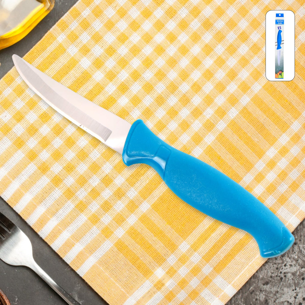 Stainless steel kitchen knife with ergonomic handle on wooden surface