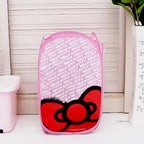 Foldable waterproof canvas laundry bag with a chic print, perfect for organisation.