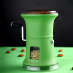 Front view of manual chilly and dry fruit cutter focusing on sharp blades and transparent window