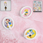 A set of cheerful yellow smiley face wall hooks displayed on a clean white surface.