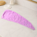 VelvaBloom Microfiber Hair Drying Towel neatly folded, ready for use or travel.