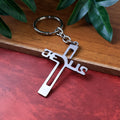 Metal cross keychain featuring Gujarati Jesus script on polished metal
