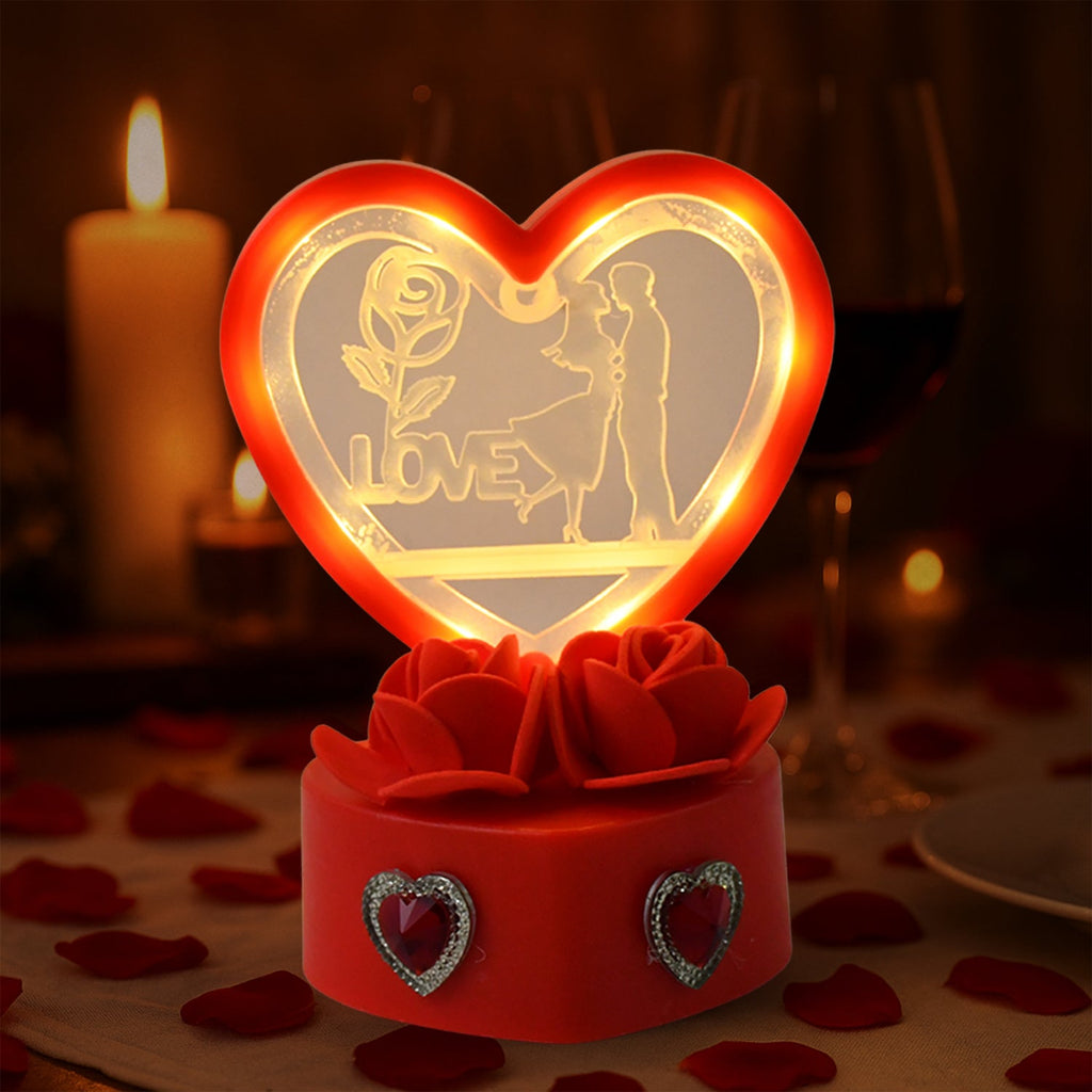 Love Couple Showpiece featuring heart-shaped frame with red rose base