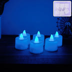 Blue LED Tea Light Candle glowing brightly in dark setting