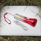 Portable LED torchlight resting on a flat surface, ready for use.