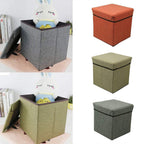 A compact cube storage stool in a living room setting, demonstrating its functionality as extra seating and storage.