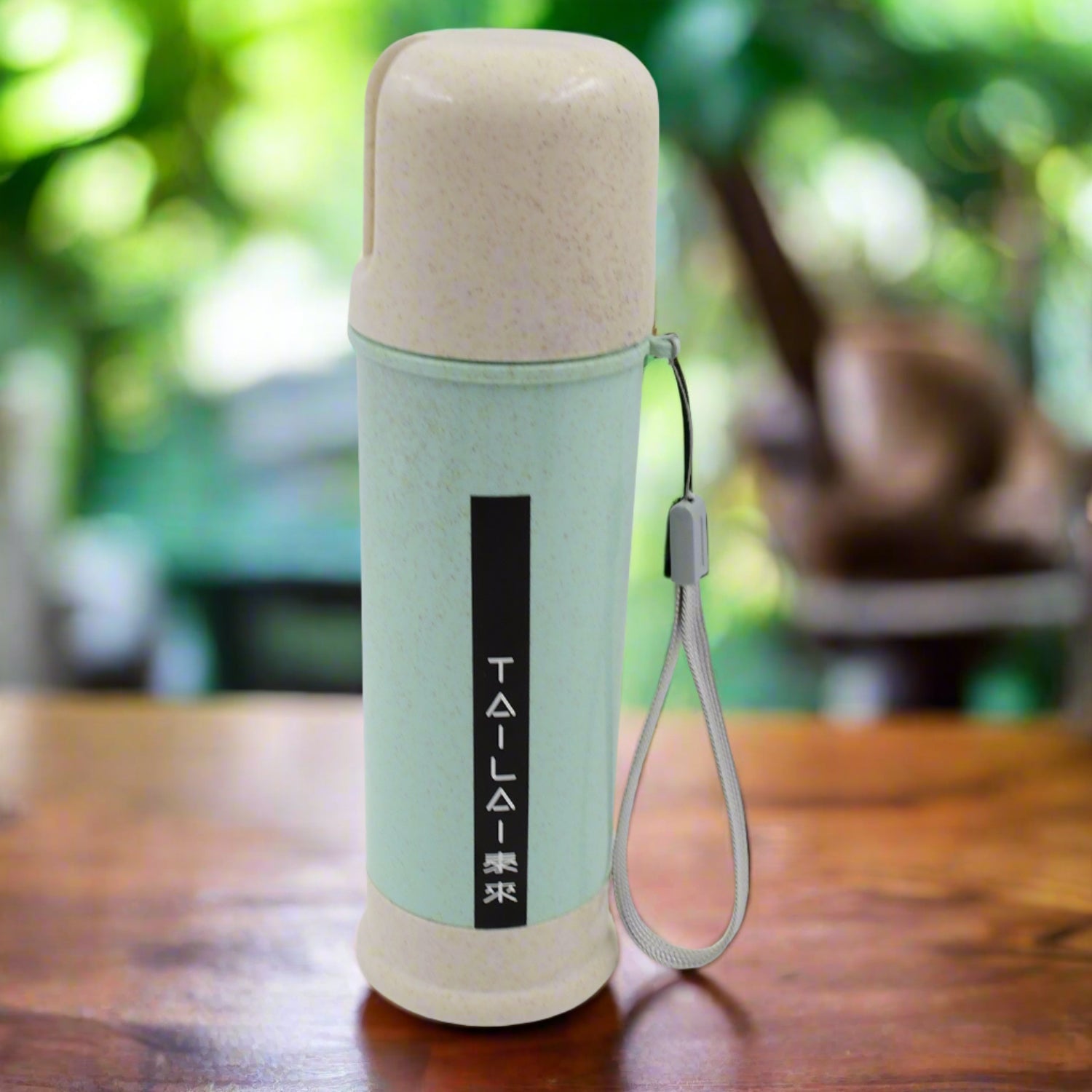 A vibrant mix-color portable water bottle made from wheat straw, shown upright.