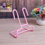 Multi-function shoe rack stand with integrated drying hanger in a modern home setting.