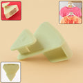 Plastic triangle hanger connector hook holding clothes vertically in closet