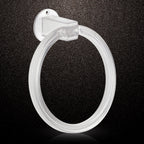 Clear ABS towel ring installed on a bathroom wall, holding a neatly folded white hand towel.