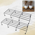 Metal rectangle flower plant stand displaying potted plants on a balcony