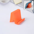 Compact plastic smartphone stand side profile showing design
