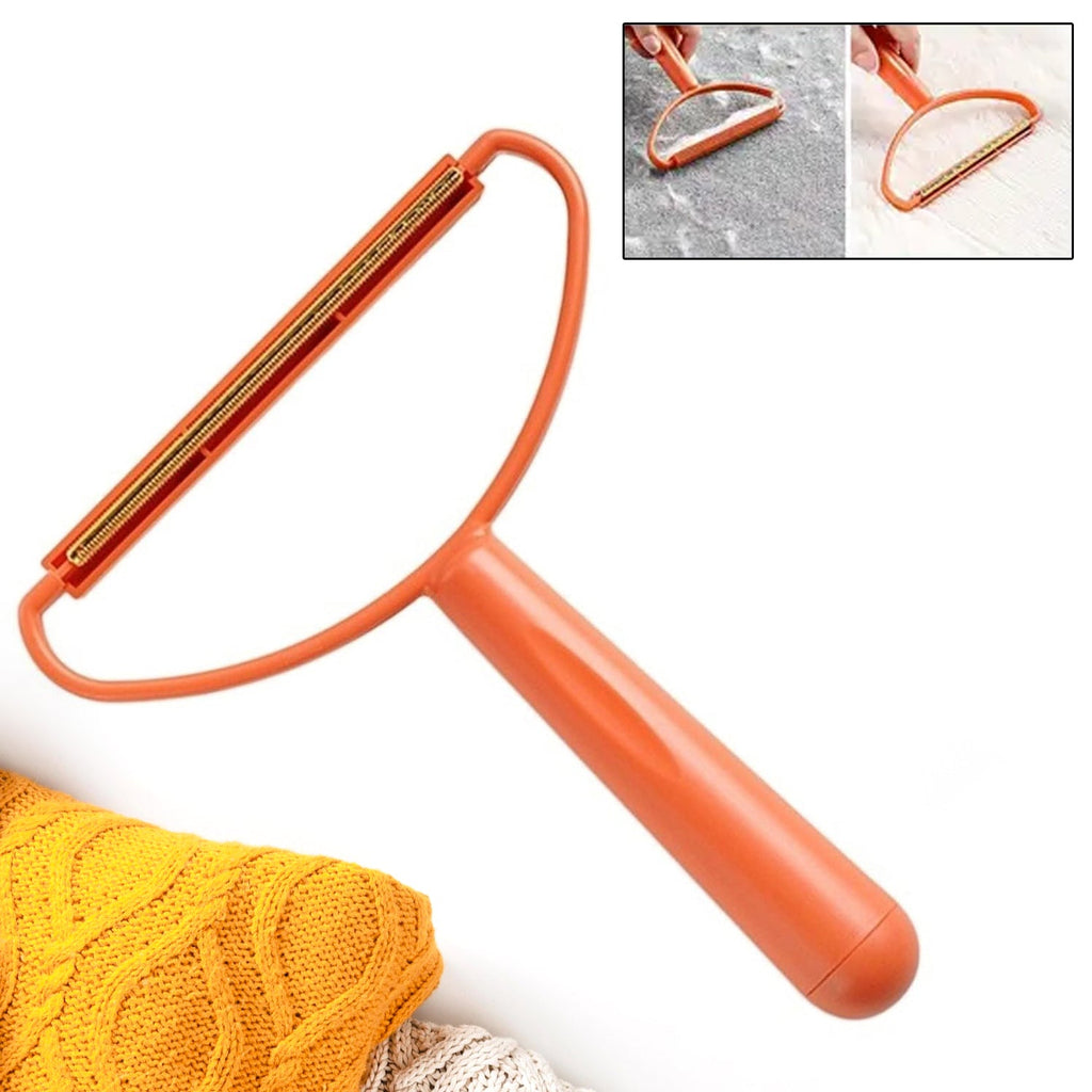 Lint remover's soft fabric brush side gently smoothing out a garment, removing light fuzz.