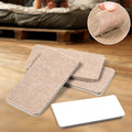 Close-up of Safelix square felt furniture pads on a wooden floor, protecting against scratches.