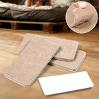 Close-up of Safelix square felt furniture pads on a wooden floor, protecting against scratches.