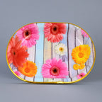 Floral plastic serving tray with a mix of colors, perfect for home use.