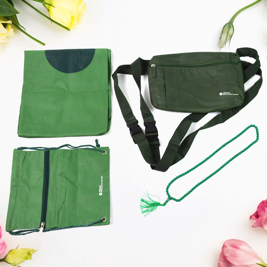A comprehensive Hajj Kit Bag set, displaying the shoulder bag, prayer mat, tasbih, and small utility pouch.