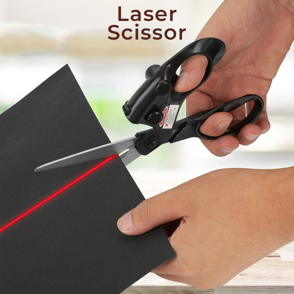 Laser Guided Scissors showing the bright red laser line on a cutting mat.