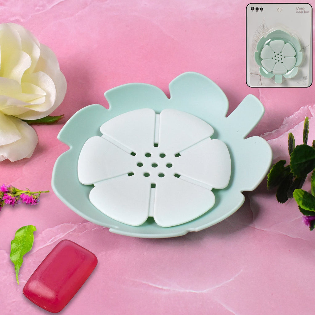 Elegant plastic soap dish with a white floral design, shown in a clean bathroom setting.