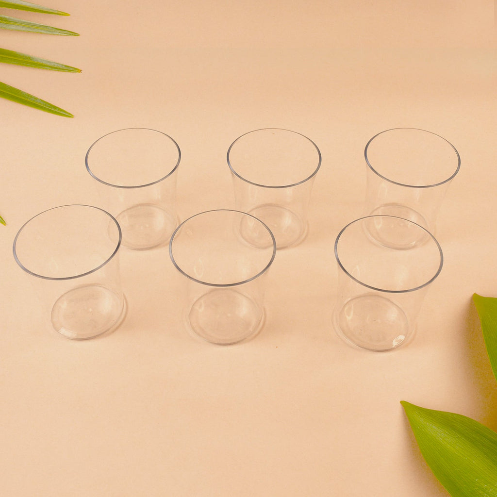 Close view of warm welcome tumbler set with clear plastic glasses