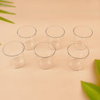 Close view of warm welcome tumbler set with clear plastic glasses