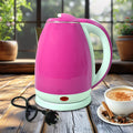 Stainless steel electric kettle 1500W with 2L capacity on a kitchen counter.