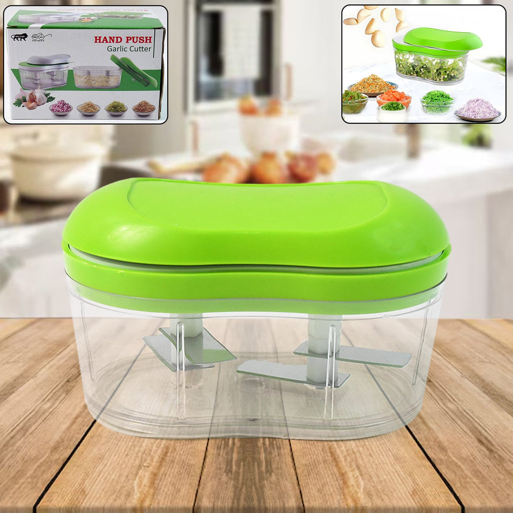 Garlic & vegetable chopper with manual hand push and clear container