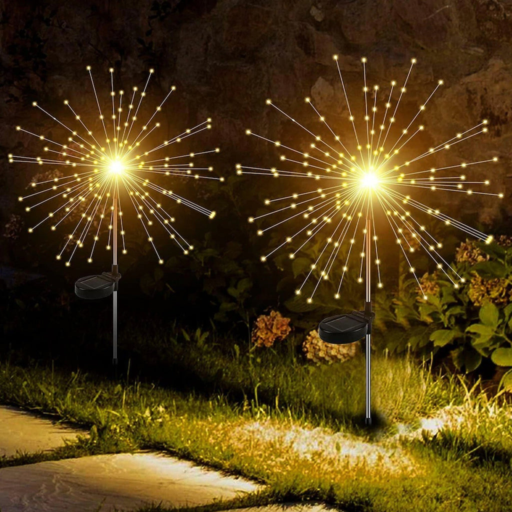 Decorative solar firework LED garden lights illuminating outdoor space