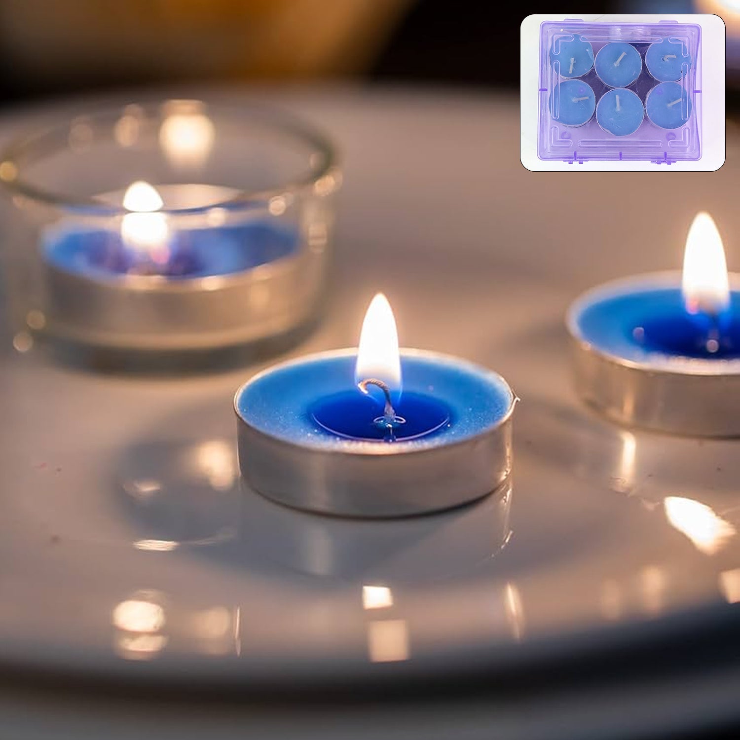 Warm glow from multiple tea light candles placed together for festive lighting