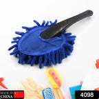 Person using a Microfiber Car Wash Brush to clean a car's side window, showing effective dusting.