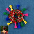Vibrant Navratri Hair Bun with multicolor tassels for festive hairstyle