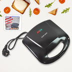 Dabster 2-slice sandwich maker with non-stick plates on a kitchen counter.