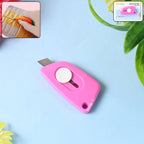Mini Cloud Cutter retractable utility knife with cloud-shaped grip on white background