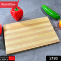 Natural wood cutting board for kitchen prep.