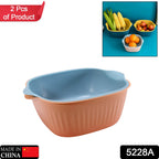 Dual-purpose kitchen drainer basket for washing fruits and vegetables.