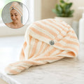 Soft microfiber hair drying towel wrap featuring teddy bear button for secure hold