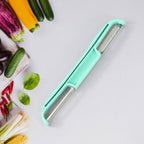Detailed view of double edge cutter blade on potato peeler