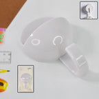 Self-adhesive strong wall hooks for heavy and multipurpose use on smooth surfaces.
