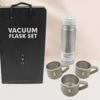 Close-up of stainless steel vacuum flask set showing rustproof finish and lid