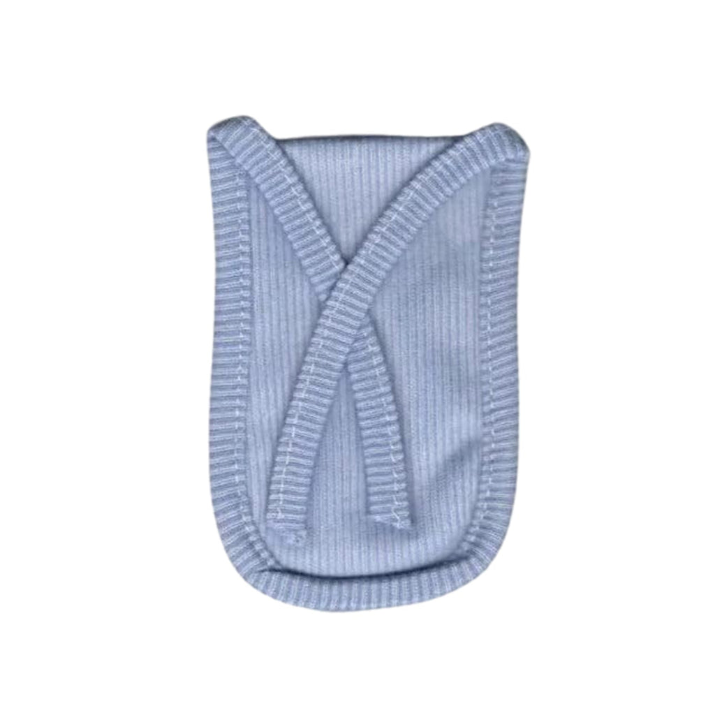 Close-up of the natural cotton fabric texture of the reusable tap filter.