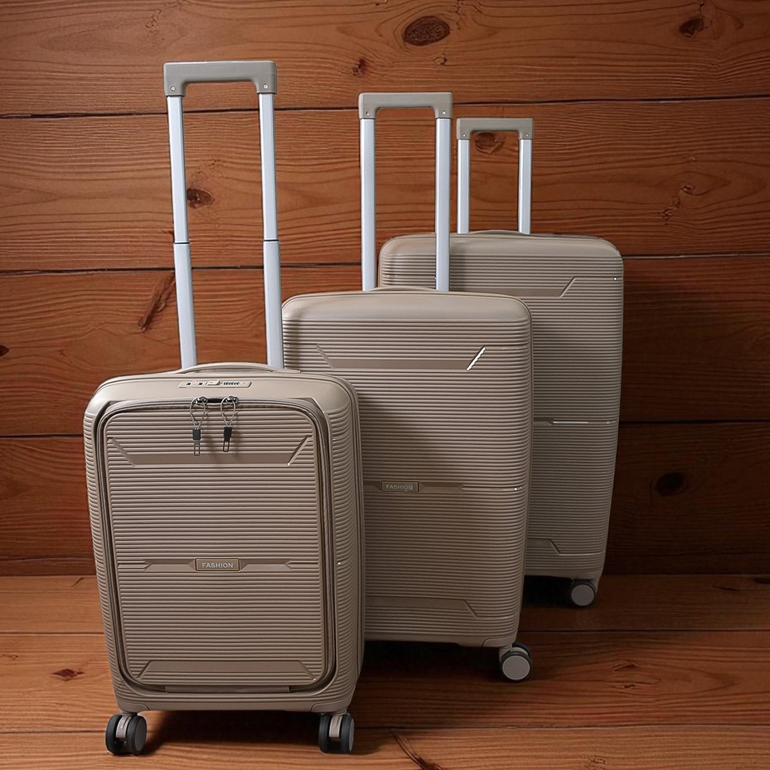 Three-piece hard-shell trolley luggage set with spinner wheels in mixed colors