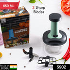 Close-up of the efficient hand push mechanism for quick vegetable chopping.