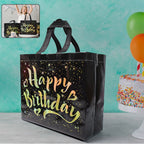 Black reusable birthday gift bag decorated with gold shiny stars