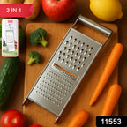 Close-up of Apex stainless steel grater and slicer blades for kitchen use