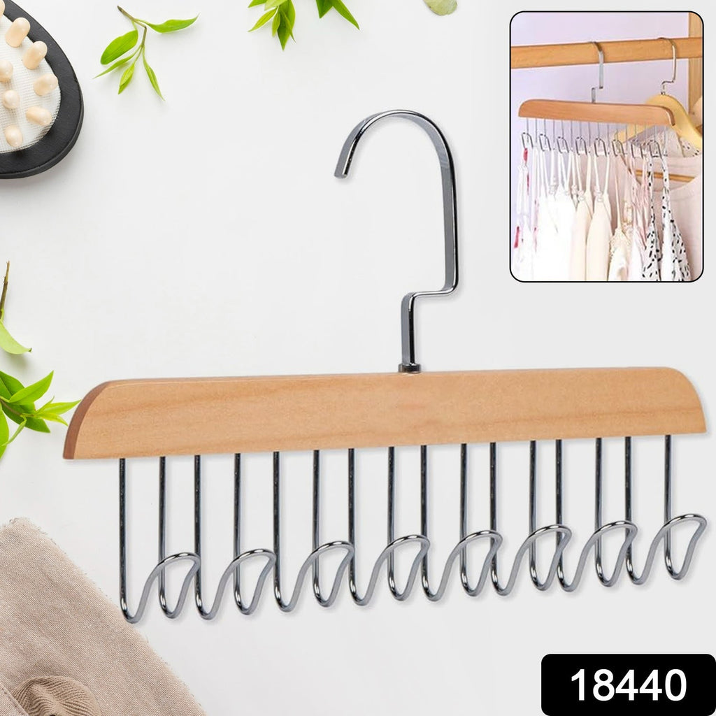 Multi-hook wooden hanger from Organivo neatly organizing various belts and ties.