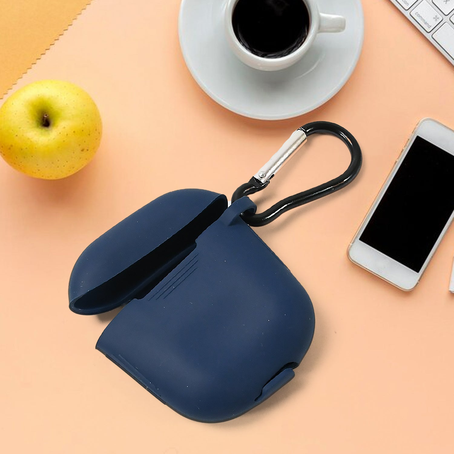 Shockproof silicone Wireless Earbuds Case with a metal keychain clasp, displayed empty.