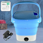 Portable washing machine in use, cleaning delicate baby clothes efficiently.