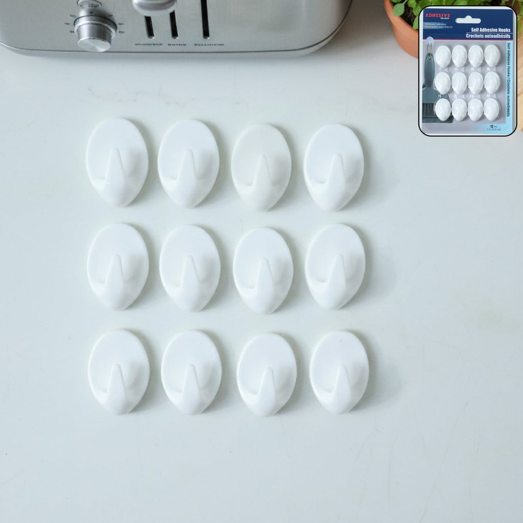 Self adhesive wall hook holding keys securely on a tiled wall