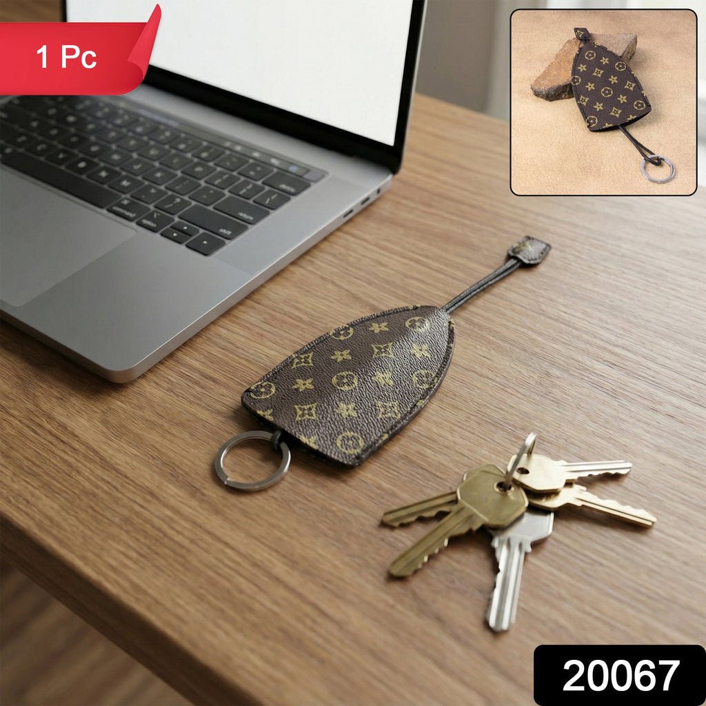 Designer-style keyholder with secure metal ring and patterned exterior