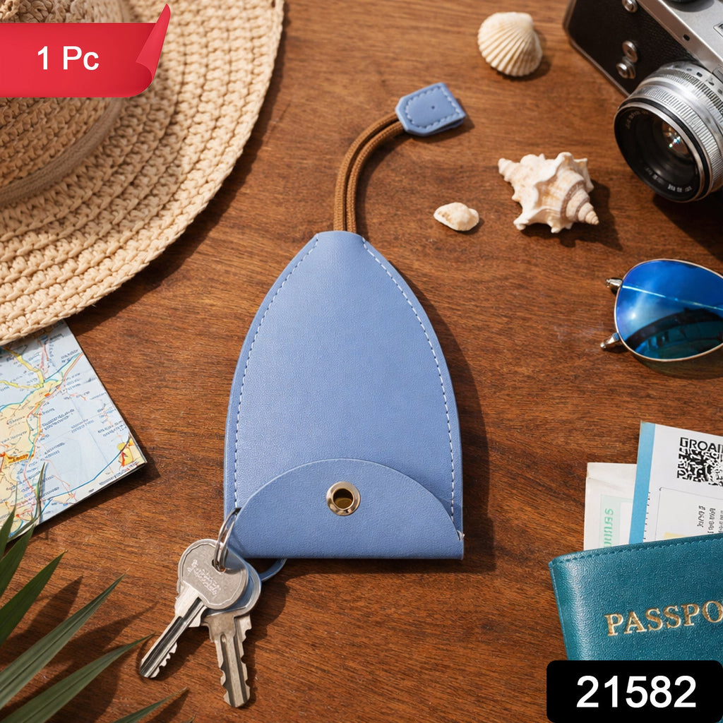 Key storage pouch with secure button closure and wrist strap